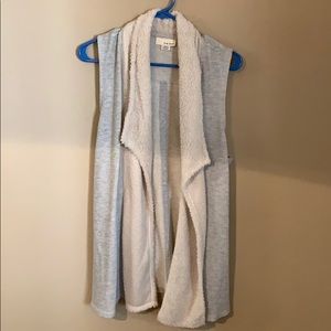 Soft fuzzy open front vest. Only worn twice.